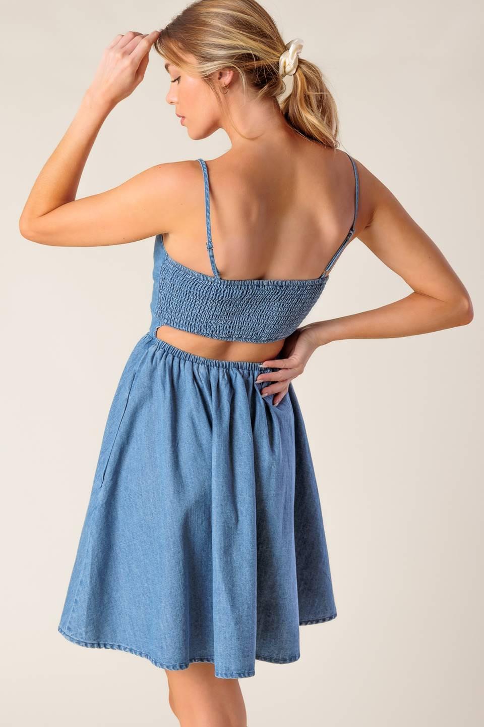 Light indigo Flying Tomato Back in Love Denim Mini Dress, showcasing a stylish casual dress with a fitted silhouette and button details.