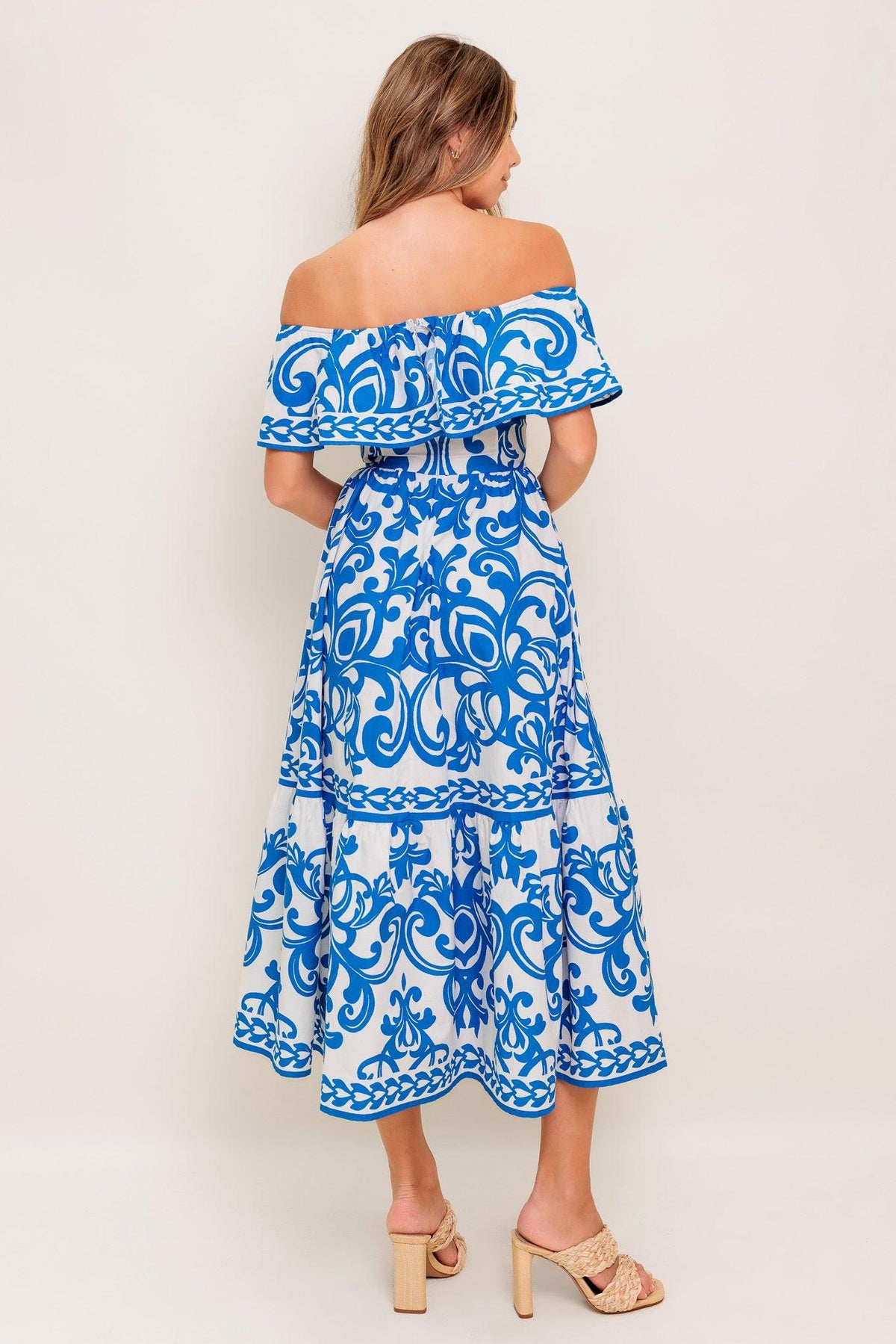 Flying Tomato Bloom Serenade Blue Woven Midi Dress featuring a flowing design and intricate pattern on lightweight fabric.