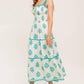 Flying Tomato Midnight Botanica woven midi dress in ivory and blue, featuring a flowing, patterned fabric perfect for casual or dressy wear.