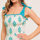 Flying Tomato Midnight Botanica woven midi dress in ivory and blue, featuring a flowing, elegant design with floral patterns.