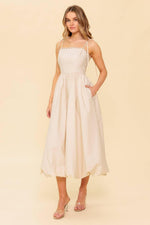 Cream woven midi dress by Flying Tomato featuring a stylish, flowy design with a fitted waist and elegant shoulder straps.