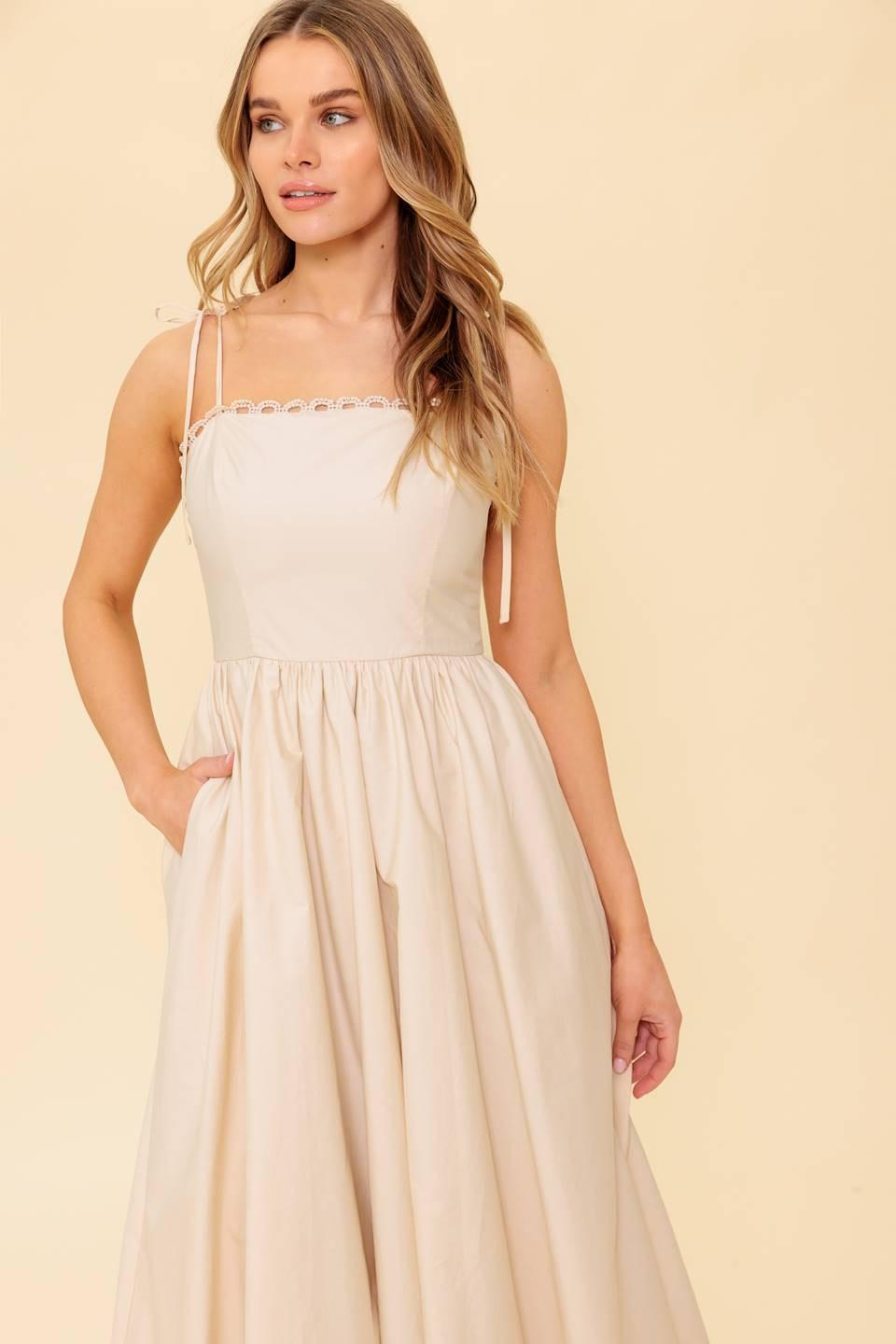 Cream woven midi dress from Flying Tomato's Regal Cutie collection, with a flowy silhouette and detailed fabric texture.