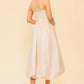 Cream woven midi dress by Flying Tomato featuring a fitted bodice and flowy skirt, perfect for casual or semi-formal occasions.