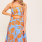Flying Tomato apricot sunset woven midi dress in blue and orange with a flowing, bohemian design.