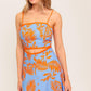Flying Tomato apricot sunset woven midi dress in blue and orange with a flowing, stylish design.