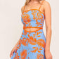 Flying Tomato apricot sunset woven midi dress in blue and orange featuring a flowing, stylish design perfect for summer wear.