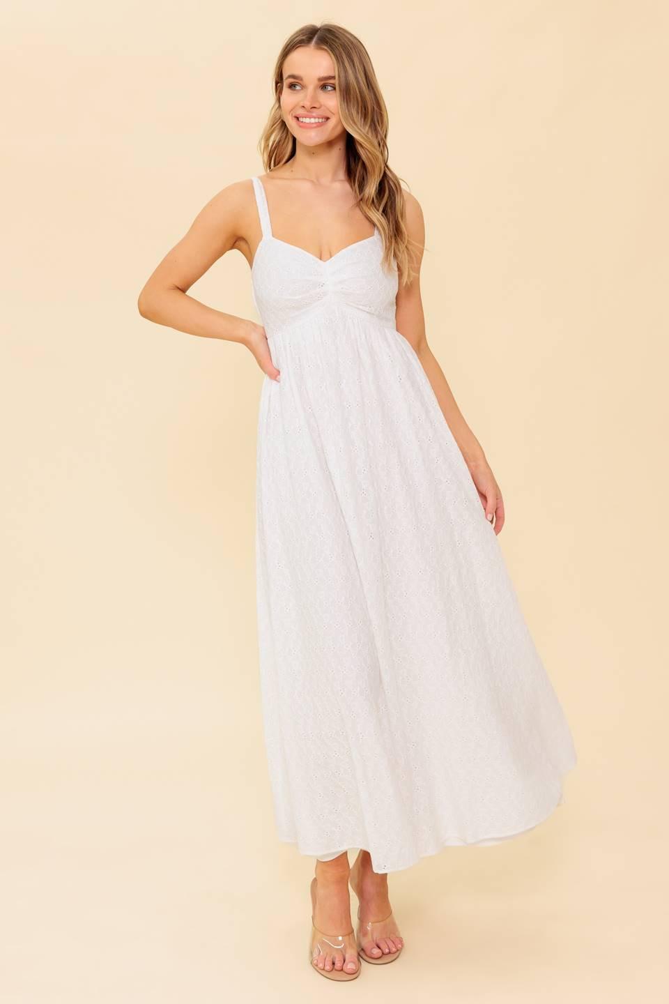Flying Tomato Love of Mine ivory eyelet midi dress displayed on a hanger, showcasing its delicate eyelet details and midi length.
