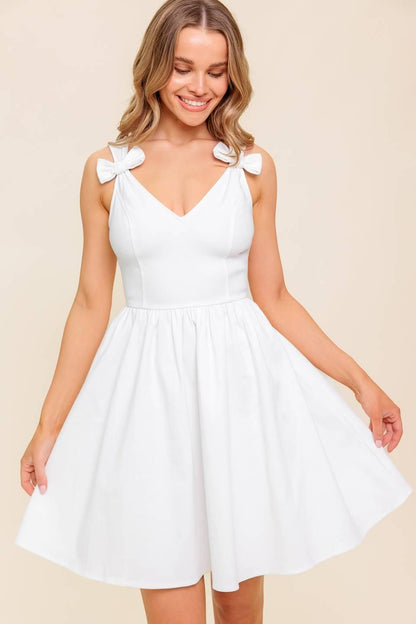 Flying Tomato Lovable Spirit white denim woven mini dress with short sleeves and fitted silhouette.
