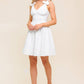 Flying Tomato Lovable Spirit white denim woven mini dress displayed on a hanger, showcasing casual summer style.