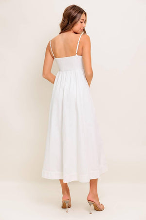 White woven midi dress by Flying Tomato from NATURE’S TOUCH collection, showcasing a stylish, flowy design with a fitted waist.
