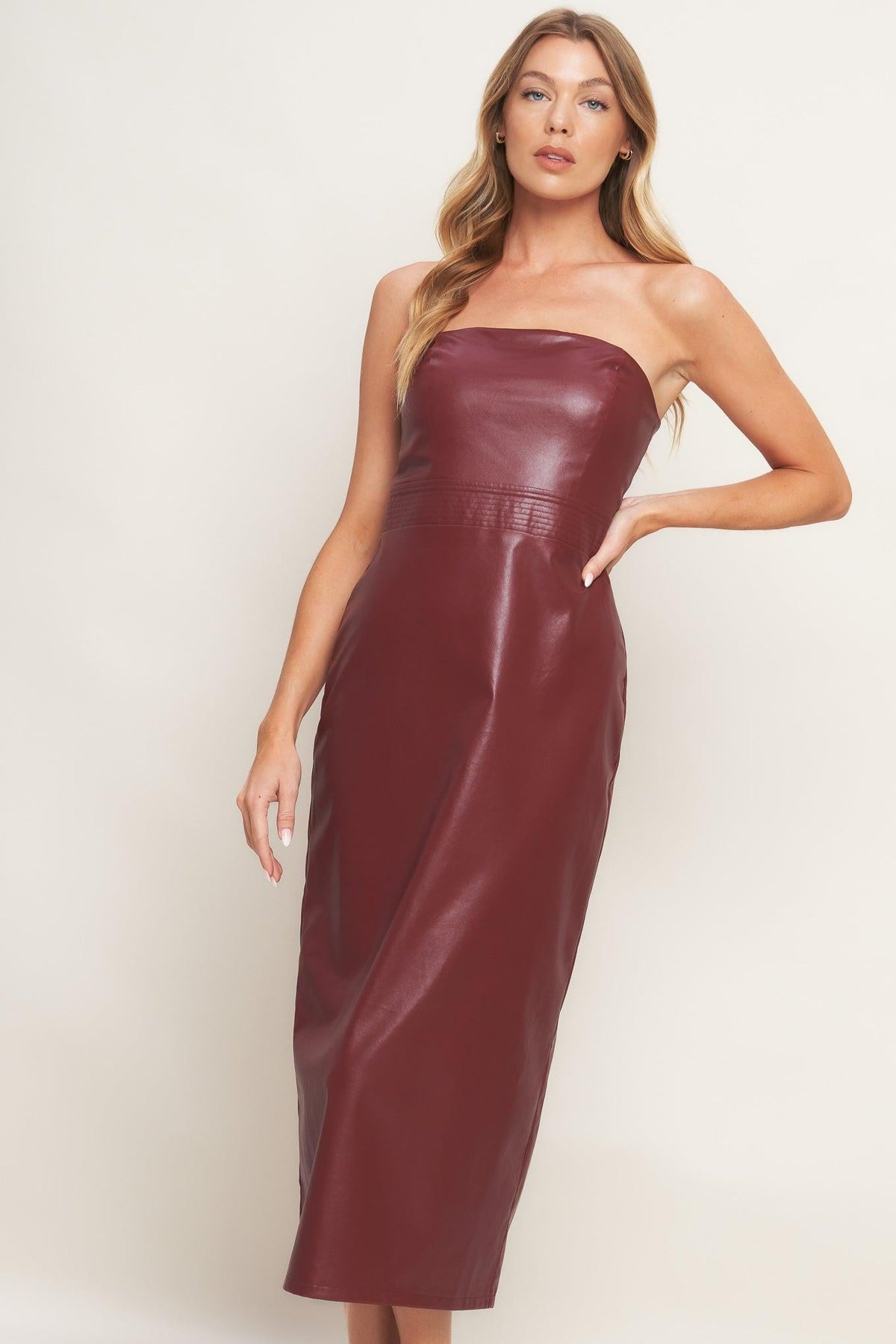 Flying Tomato burgundy faux leather midi dress, stylish and fitted, shown on a model with a high neckline and sleek silhouette.