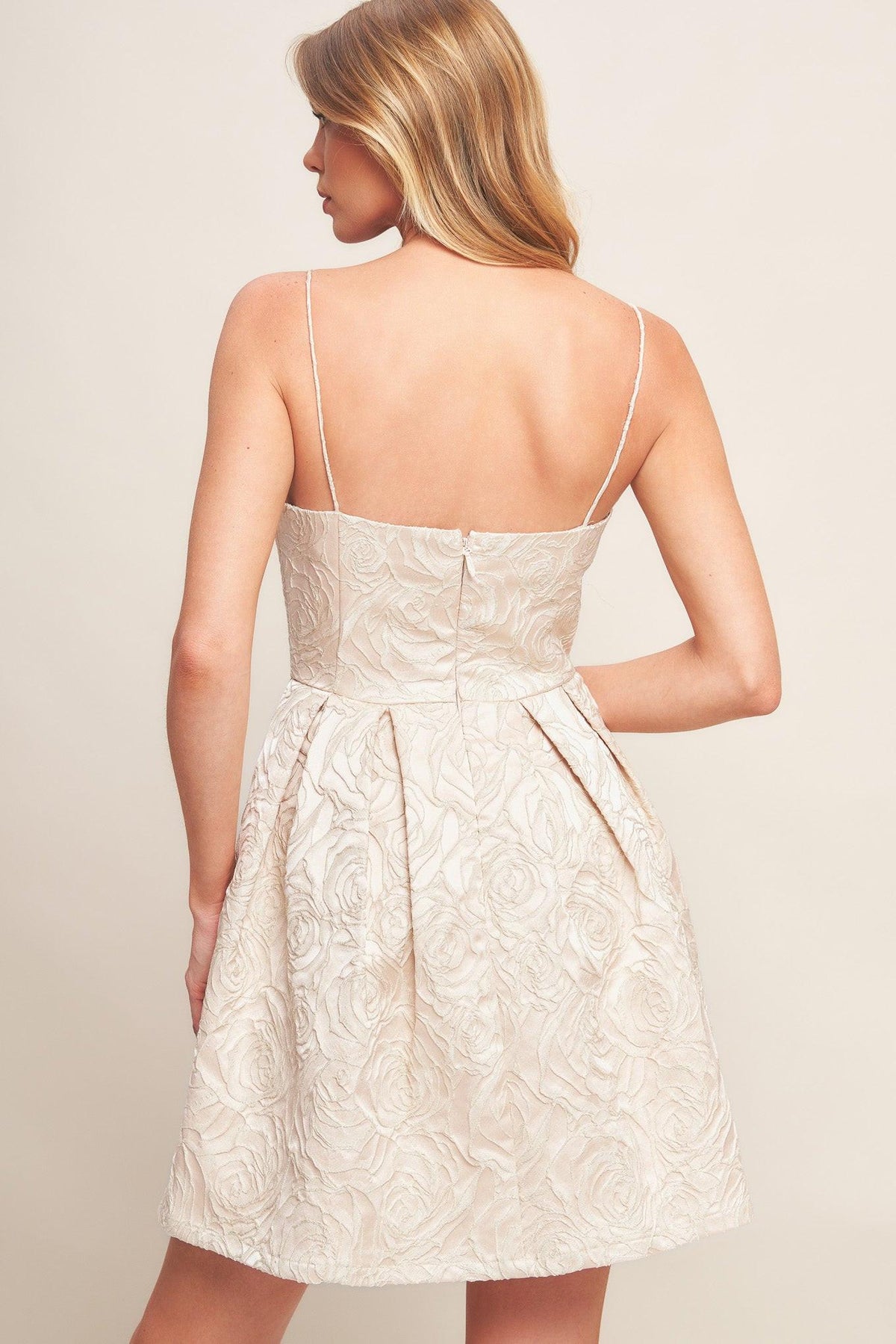 Blush woven mini dress from Flying Tomato's Romantic Garden collection, featuring floral patterns and lightweight fabric.