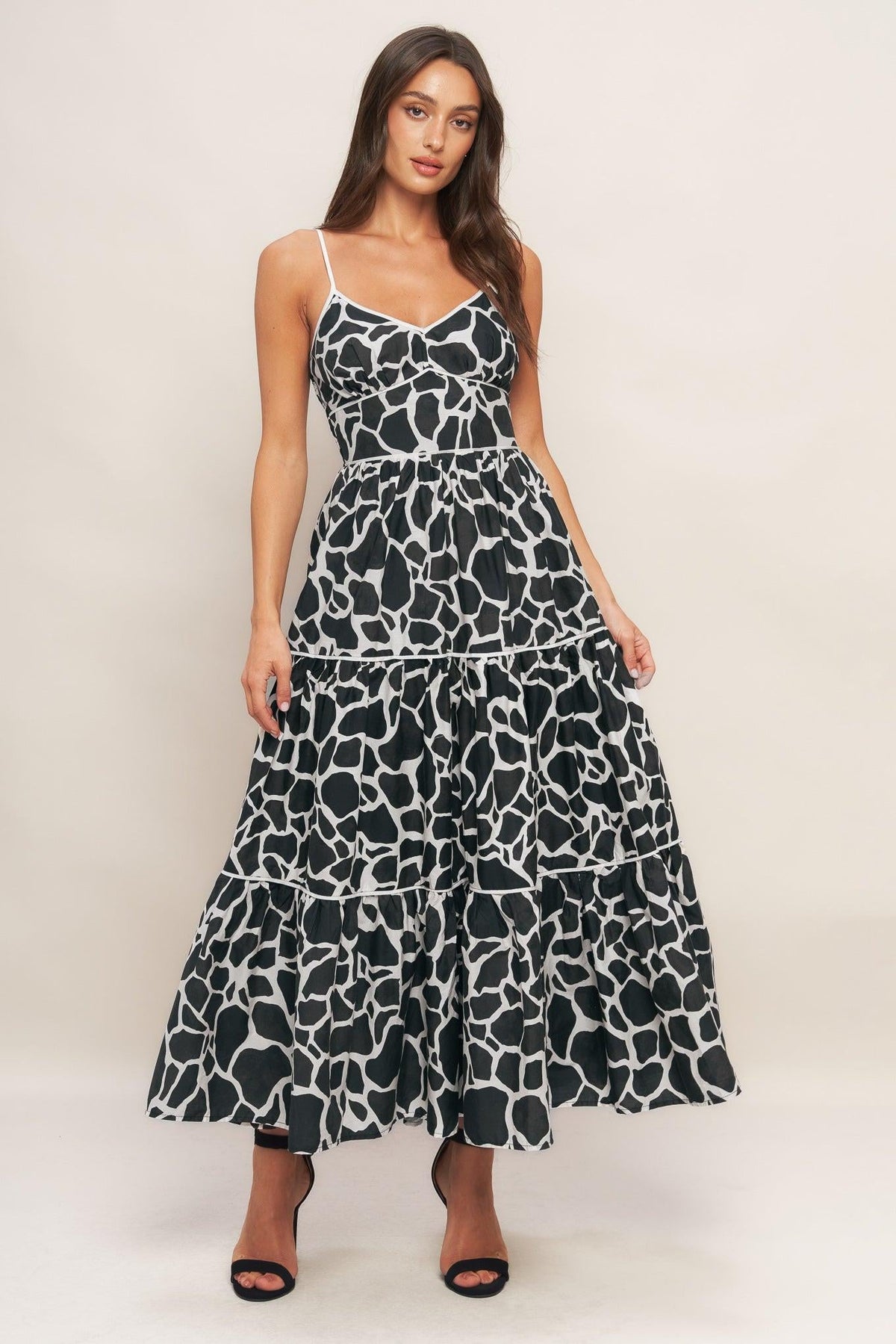 Flying Tomato Urban Wild woven midi dress in ivory and black, shown on a hanger with detailed fabric texture.
