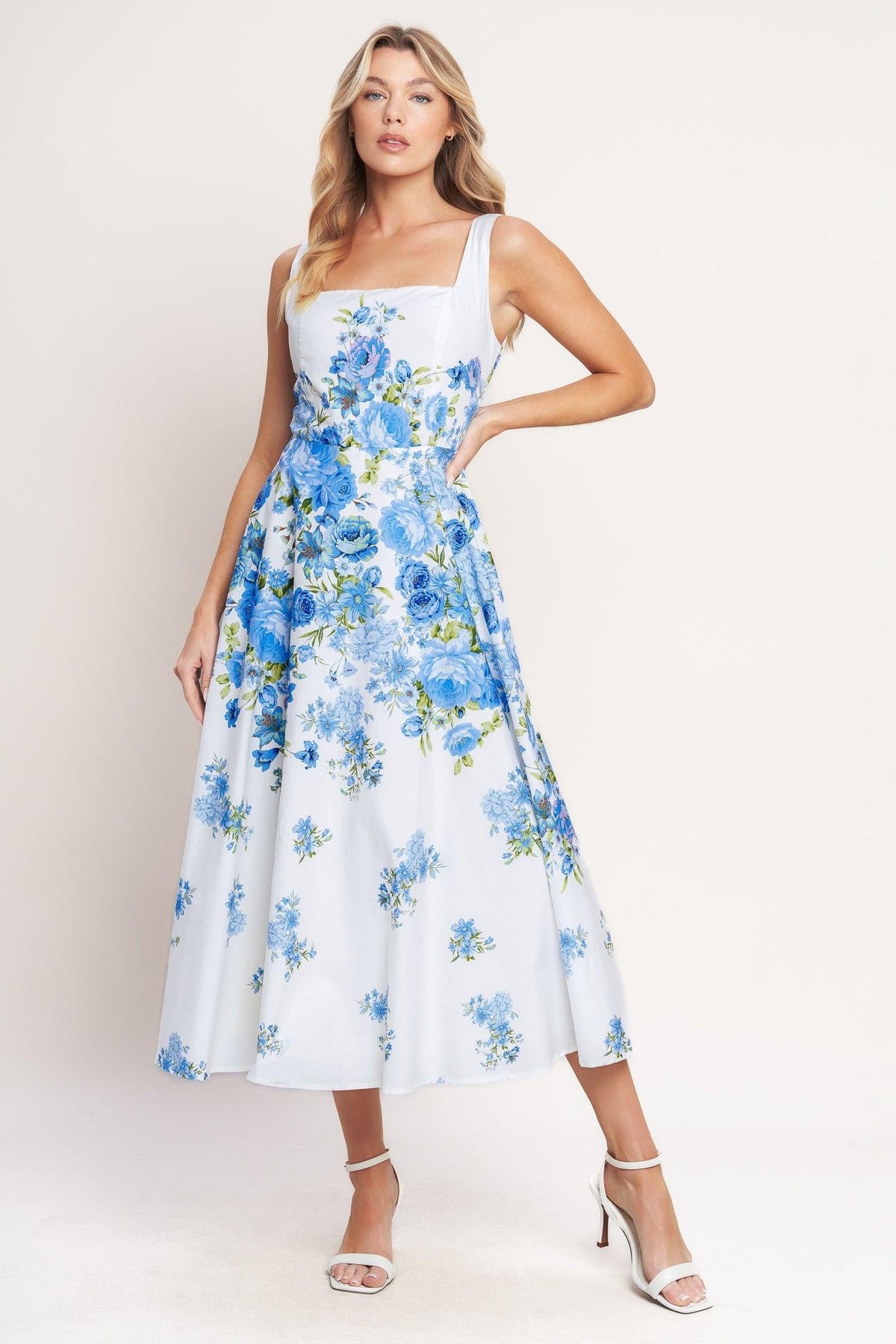 Flying Tomato Classic Bloom Day woven midi dress in white and blue with a floral pattern, featuring a fitted waist and sleeveless design.