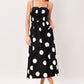 Black DOT THEORY woven midi dress by Flying Tomato, featuring a stylish, flowy fabric and a midi length design.