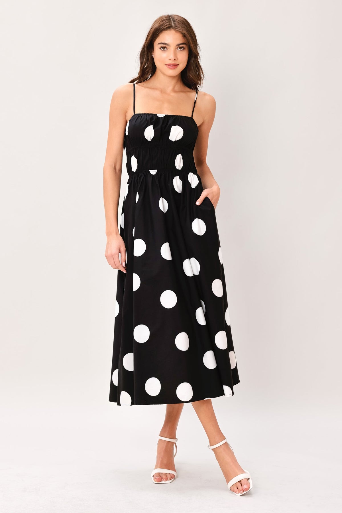 Black DOT THEORY woven midi dress by Flying Tomato, featuring a stylish, flowy fabric and a midi length design.