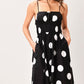 Flying Tomato Dot Theory woven midi dress in black, featuring a stylish, flowy fabric and a mid-length design for casual elegance.