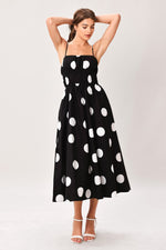 Black woven midi dress by Flying Tomato featuring a flowy silhouette and subtle textured fabric.