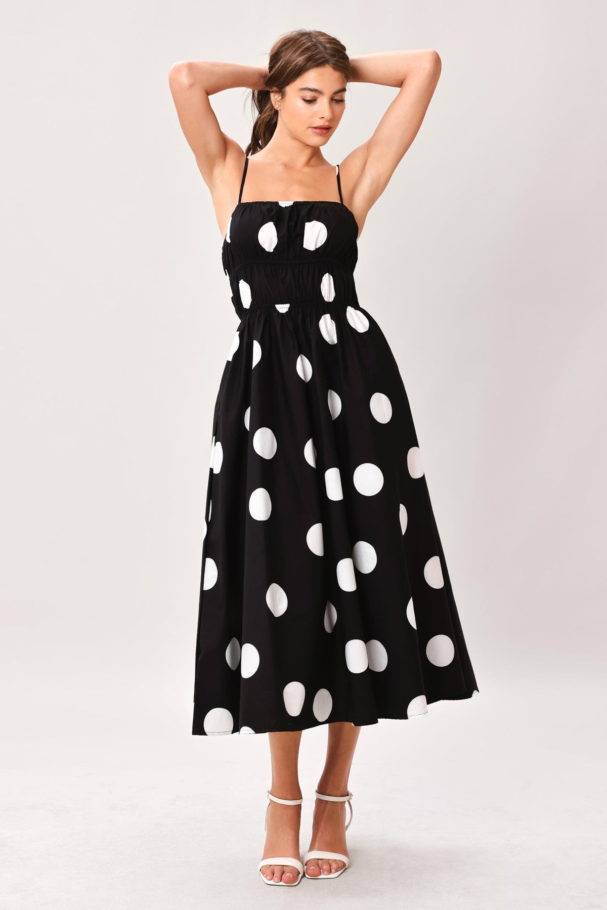 Black woven midi dress by Flying Tomato featuring a flowy silhouette and subtle textured fabric.