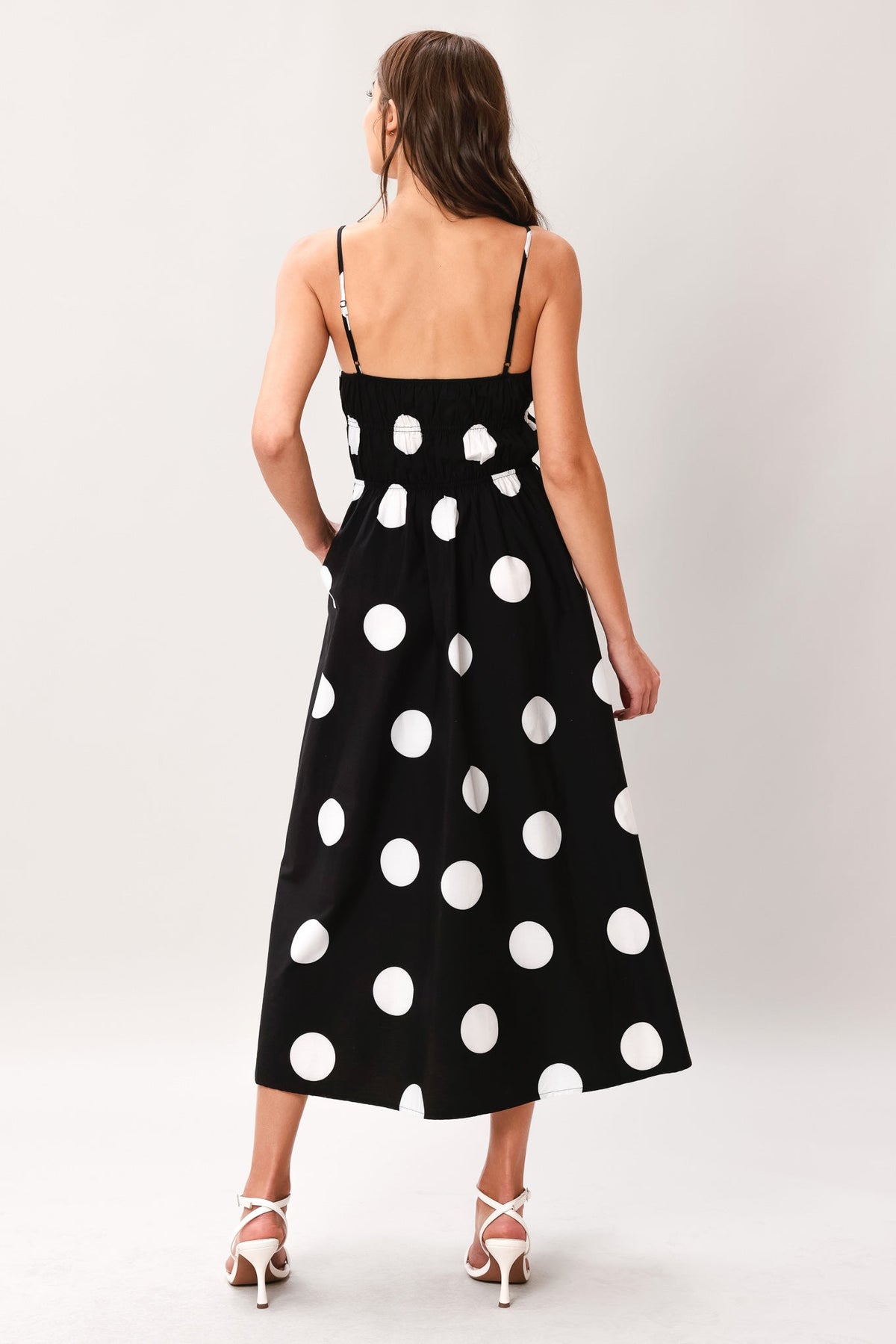 Black woven midi dress from Flying Tomato's Dot Theory collection, featuring a stylish, flowy design and midi length.