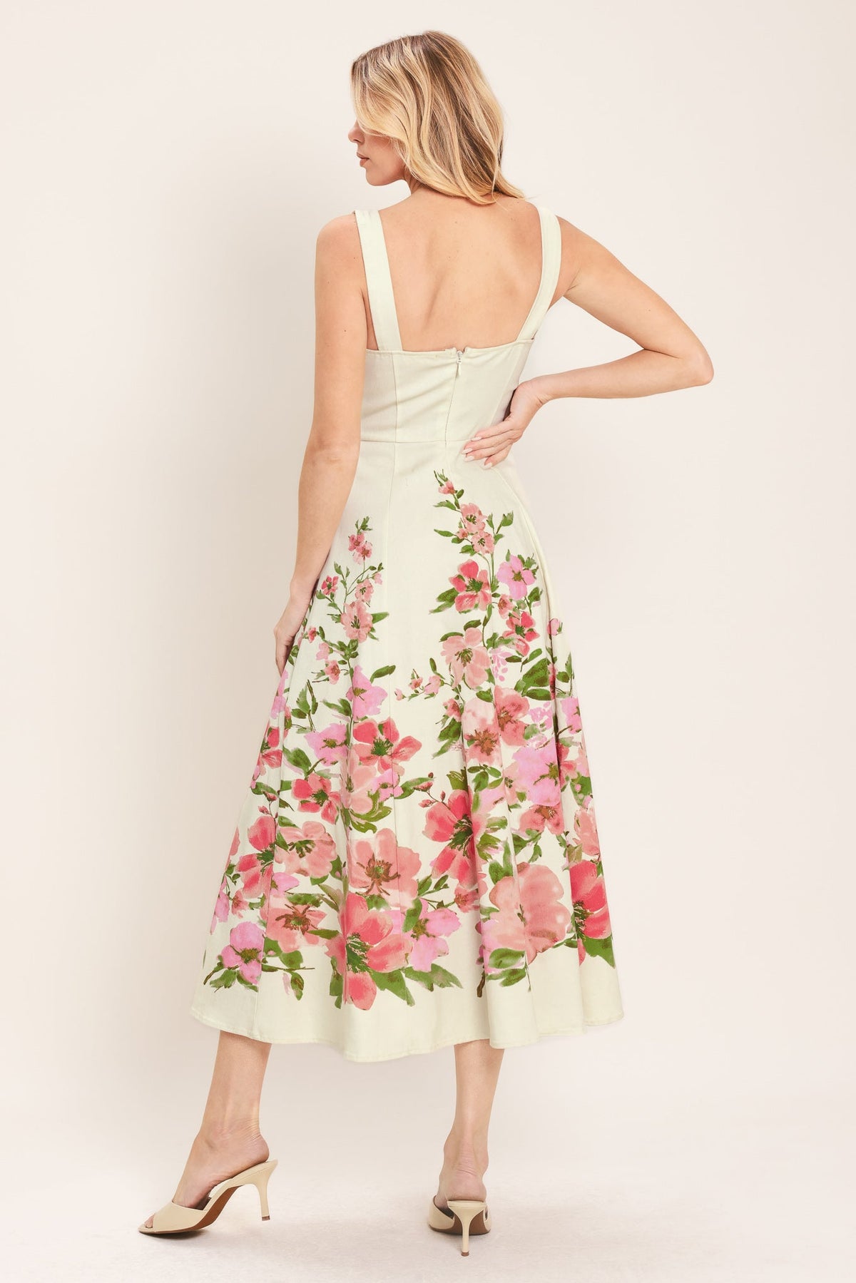 Flying Tomato Blossom Whisper woven midi dress in white and pink floral pattern, displayed on a mannequin.
