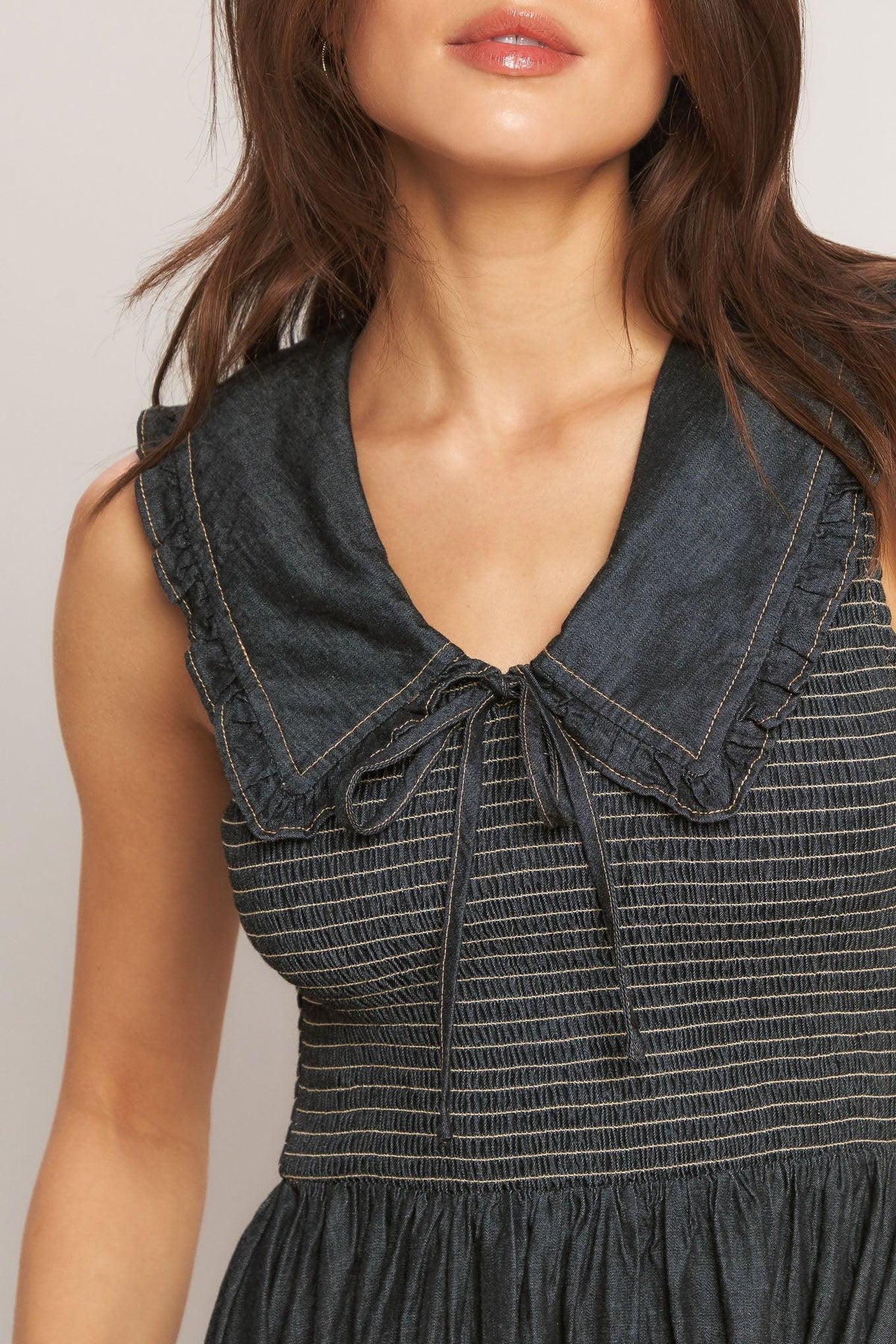 Dark Indigo Flying Tomato woven midi dress with elegant design, styled with a fitted bodice and flowing skirt.