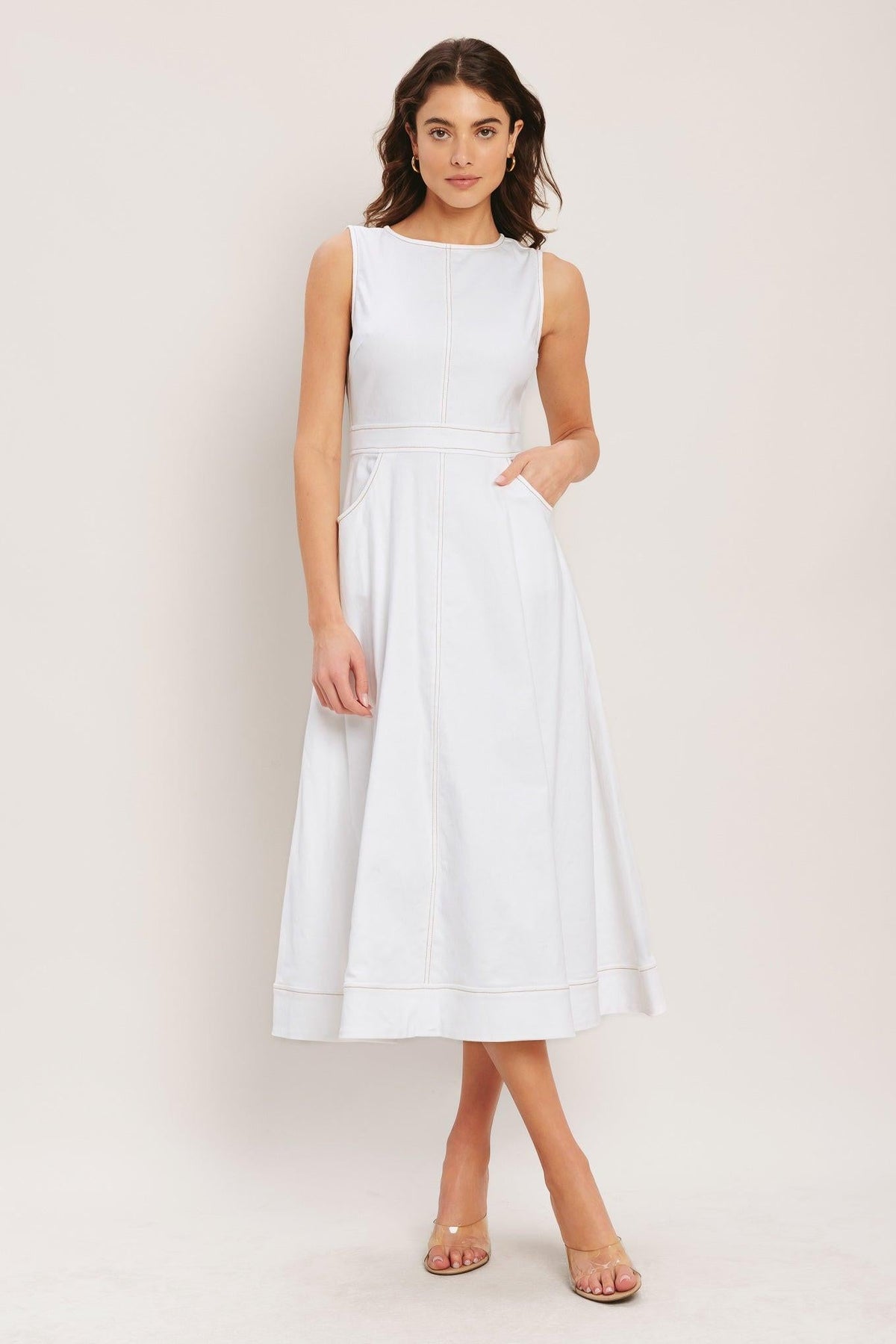 White Flying Tomato Cloudlight Summer Woven Midi Dress displayed on a hanger, showcasing its lightweight fabric and midi length.