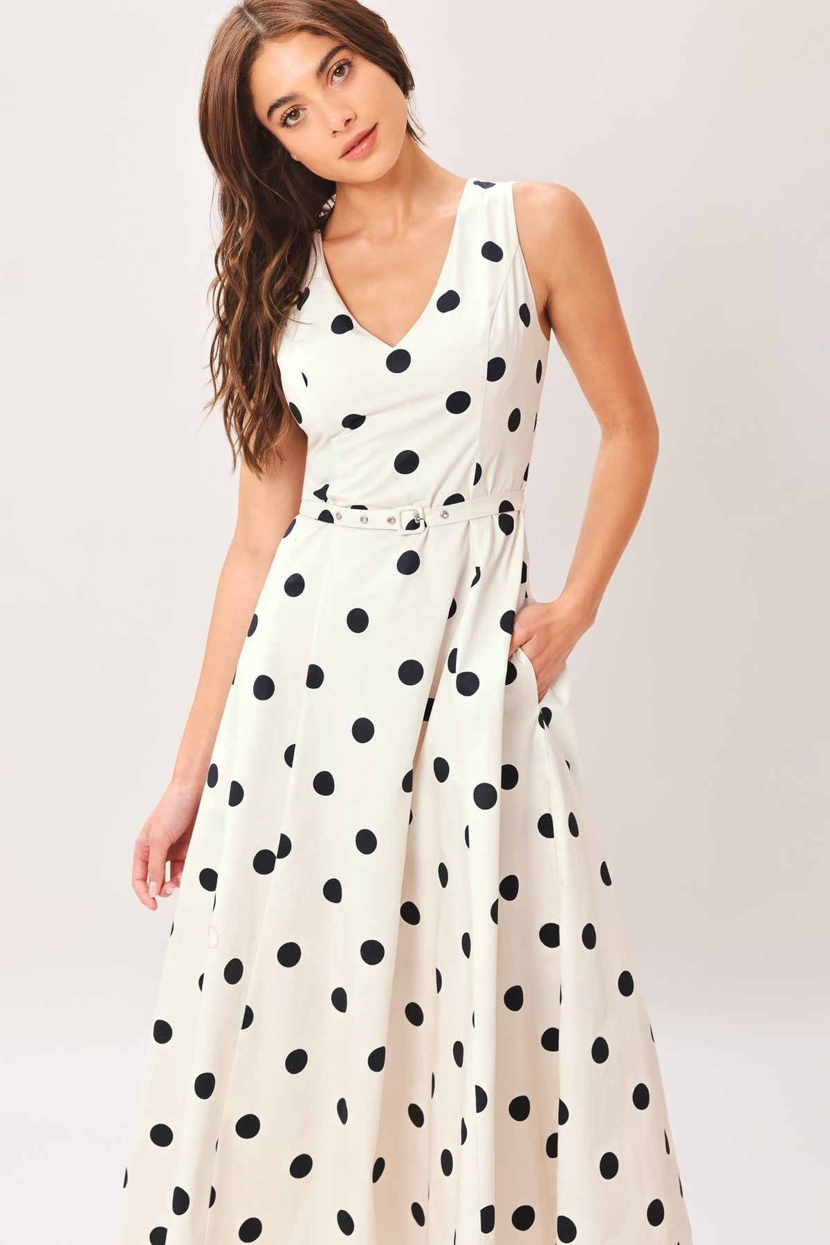 Ivory polka dot woven midi dress by Flying Tomato, featuring a flowing silhouette and classic pattern, perfect for casual or semi-formal wear.