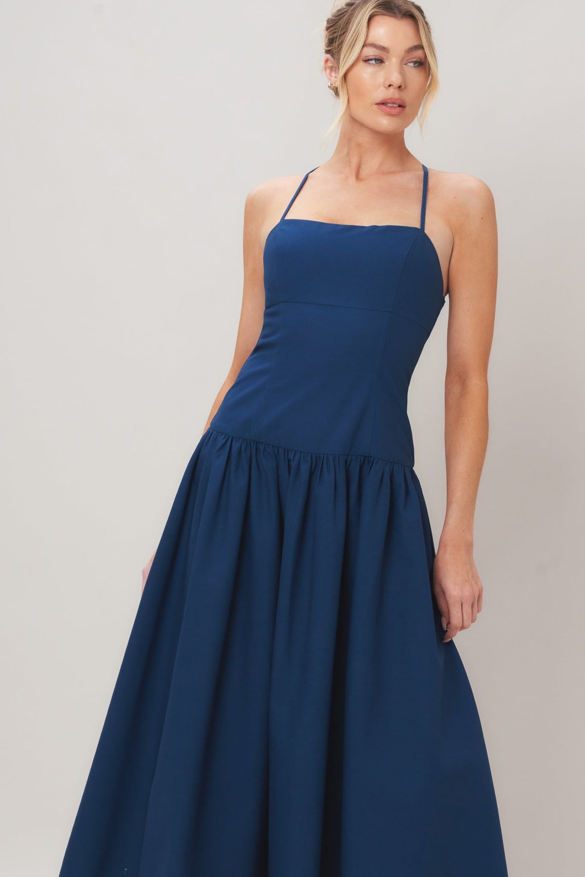 Navy woven midi dress from Flying Tomato's Refined Flow collection, featuring a stylish, flowing design and elegant silhouette.