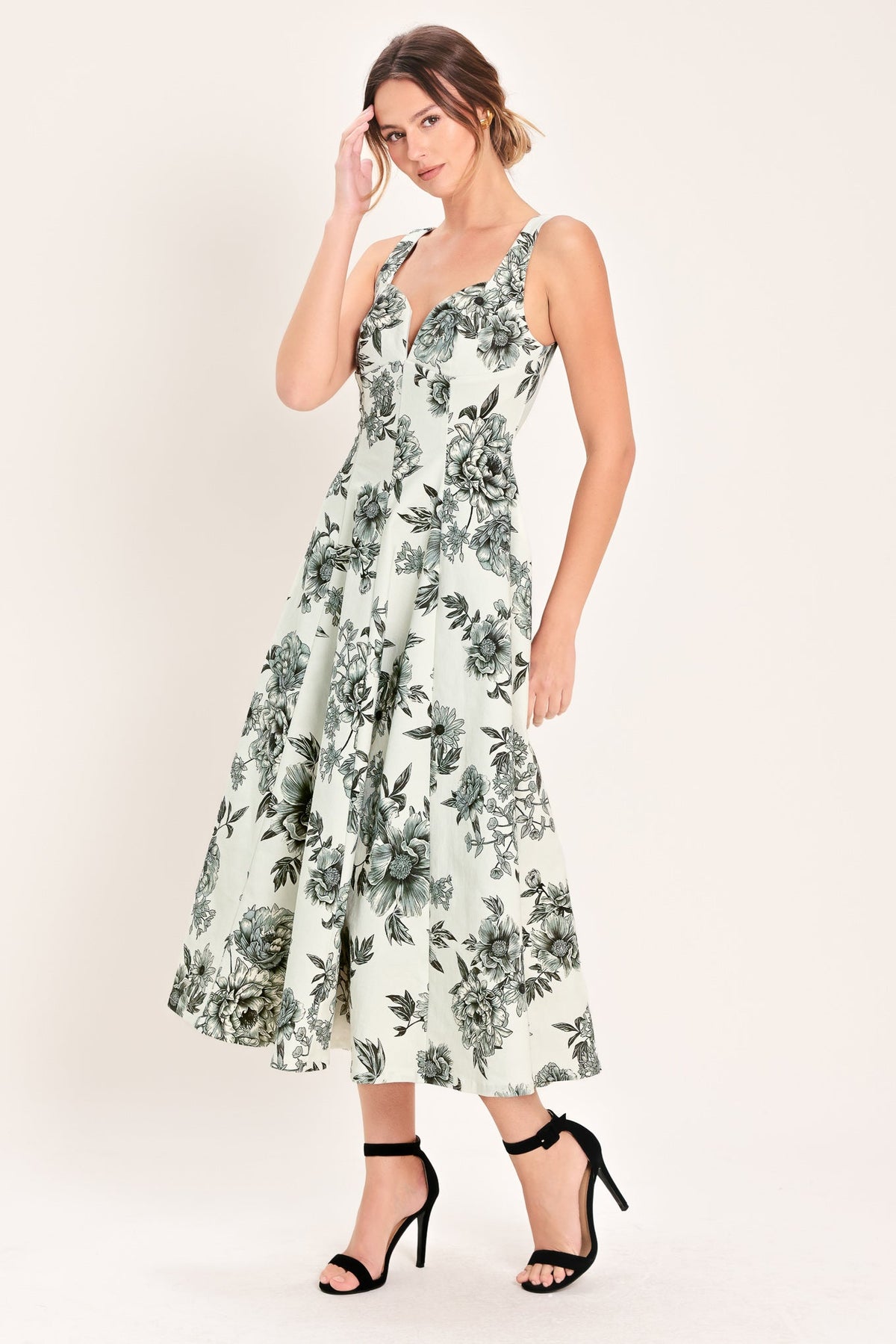 Cream and black woven midi dress by Flying Tomato, showcasing a stylish, flowy design with intricate woven fabric.