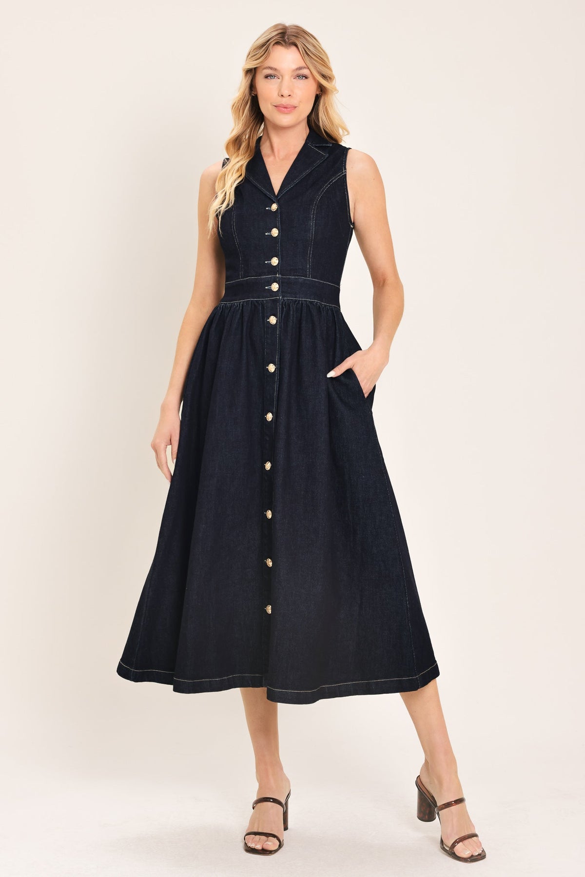Flying Tomato Indigo Charm Denim Midi Dress displayed on a hanger with a fitted bodice and flowing skirt in dark indigo denim.