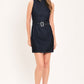 Deep indigo Flying Tomato Poise denim mini dress with long sleeves and fitted silhouette, displayed on a hanger.