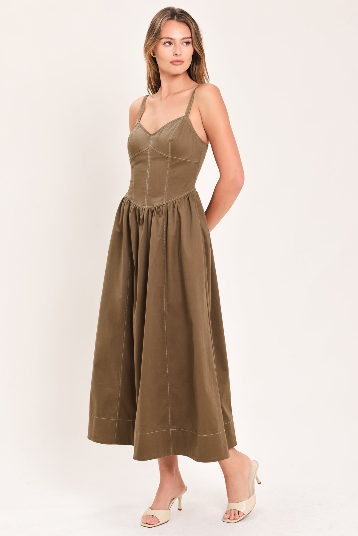 Flying Tomato Prairie Heart Ballad woven midi dress in brown, showcasing its intricate woven fabric and flowing silhouette.