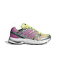 Side view of Adidas Womens Adistar Control 5 sneakers in lilac with white details, designed for running and active wear.