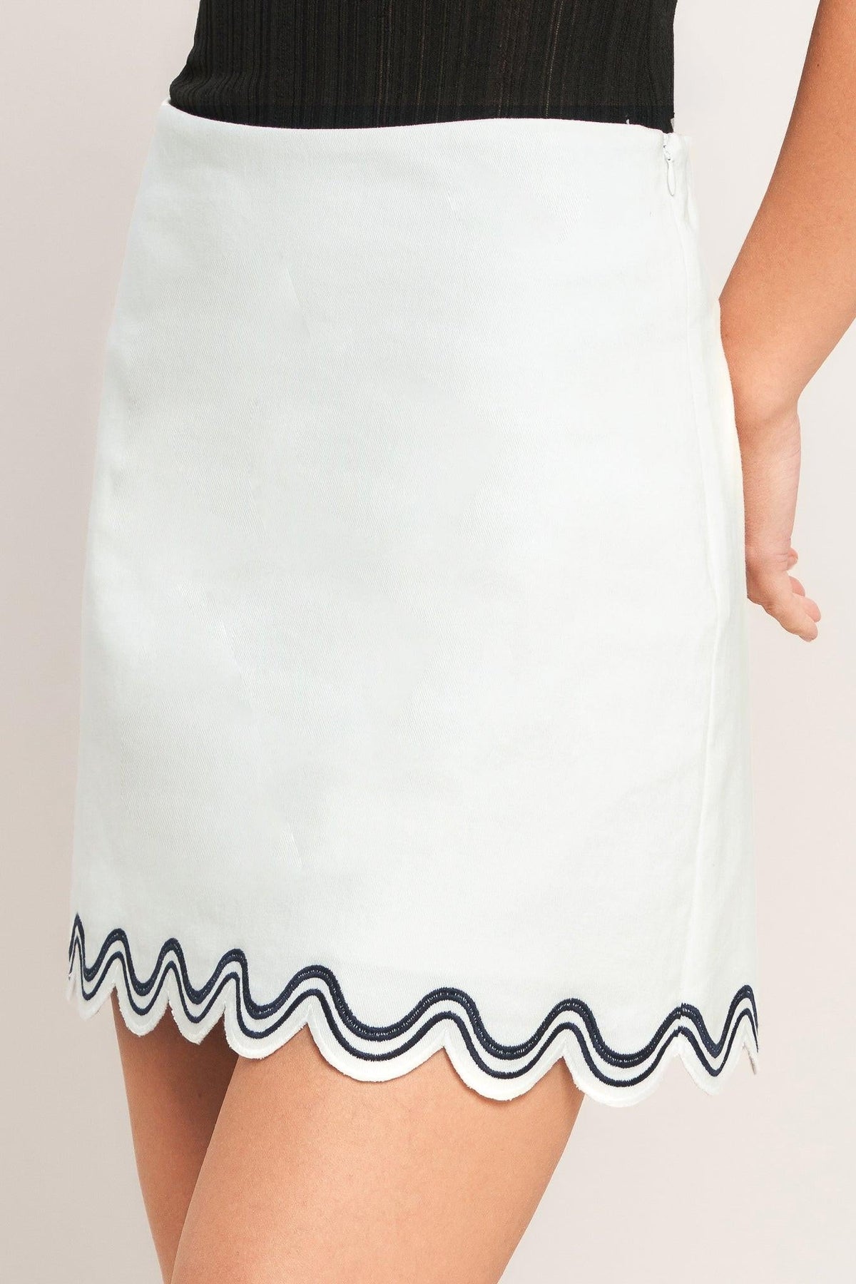 Off-white woven mini skirt from Flying Tomato's Urban Wave collection, featuring a stylish, textured design.