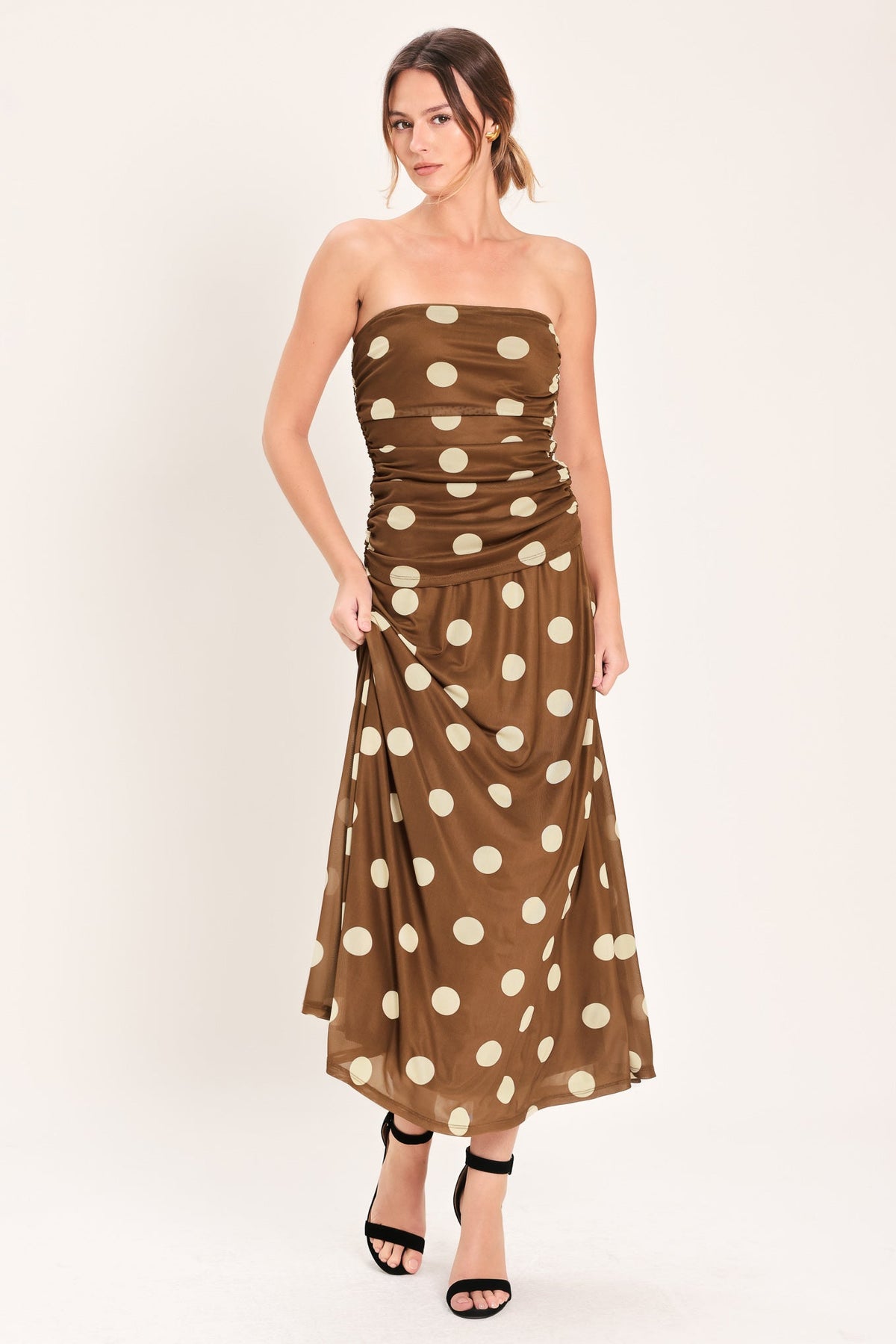 Flying Tomato French Girl polka dot power mesh midi skirt in brown, showcasing its flowy fabric and stylish design.