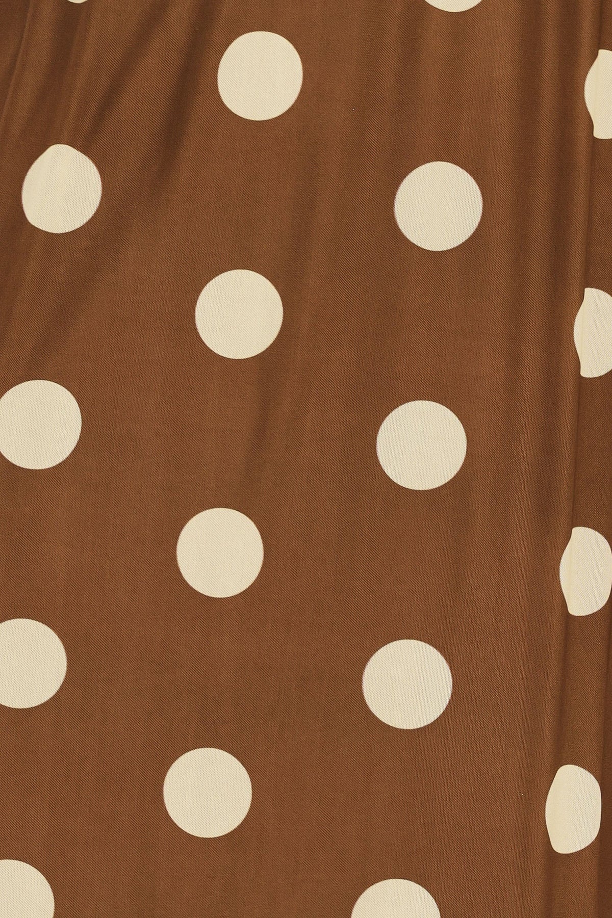 Flying Tomato brown polka dot power mesh midi skirt with a fitted waist and flowing silhouette.