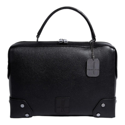 Thebagicon Grandmère Trunk Bag in leather, featuring vintage-inspired design with sturdy handle and detailed stitching.