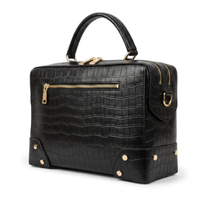 Thebagicon Grandmere Trunk Bag in leather, featuring vintage-inspired design with multiple compartments and gold-tone accents.