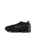 Black Nike Womens Air Vapormax 2023 Flyknit sneakers, lightweight athletic footwear with breathable knit upper.