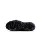 Black Nike Air Vapormax 2023 Flyknit women's sneakers with breathable knit upper and lightweight sole.