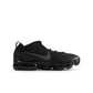 Black Nike Womens Air Vapormax 2023 Flyknit running shoes with breathable knit uppers and cushioned soles.
