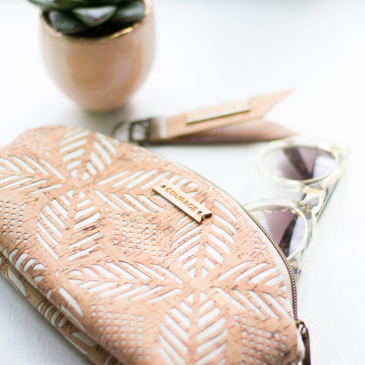 Carry Courage RULE BREAKER cream zippered pouch with bold black lettering