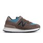 New Balance men's 574 sneakers in brown and blue, casual footwear with suede and mesh upper, displayed on a neutral background.