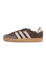 Men's Adidas Samba OG sneakers in brown and putgre, side view.