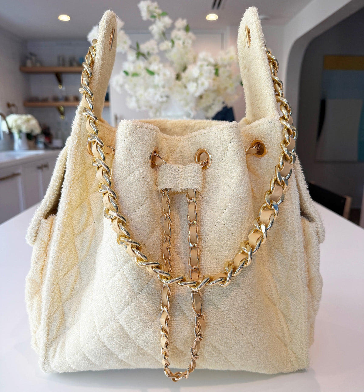 BEACH HAUS Bayshore Medium Bucket Bag in butter yellow, featuring a structured silhouette and top handle