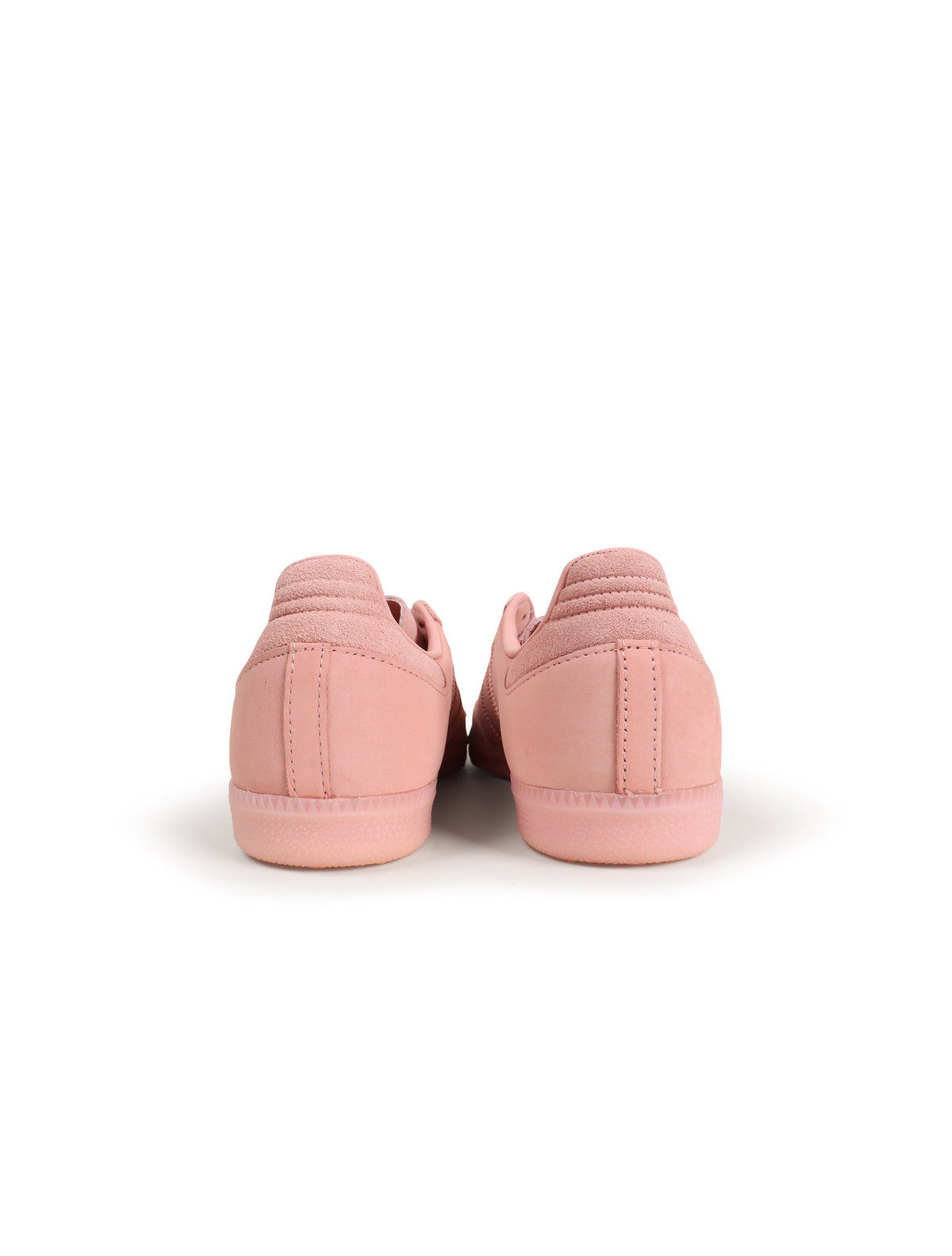 Adidas Women's Samba OG Wonder Mauve sneakers with white soles and laces, showcasing classic footwear style.