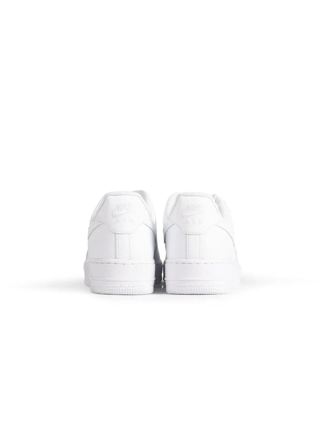 White Nike Womens Air Force 1 '07 sneakers with clean leather upper and classic design, shown from a side view.