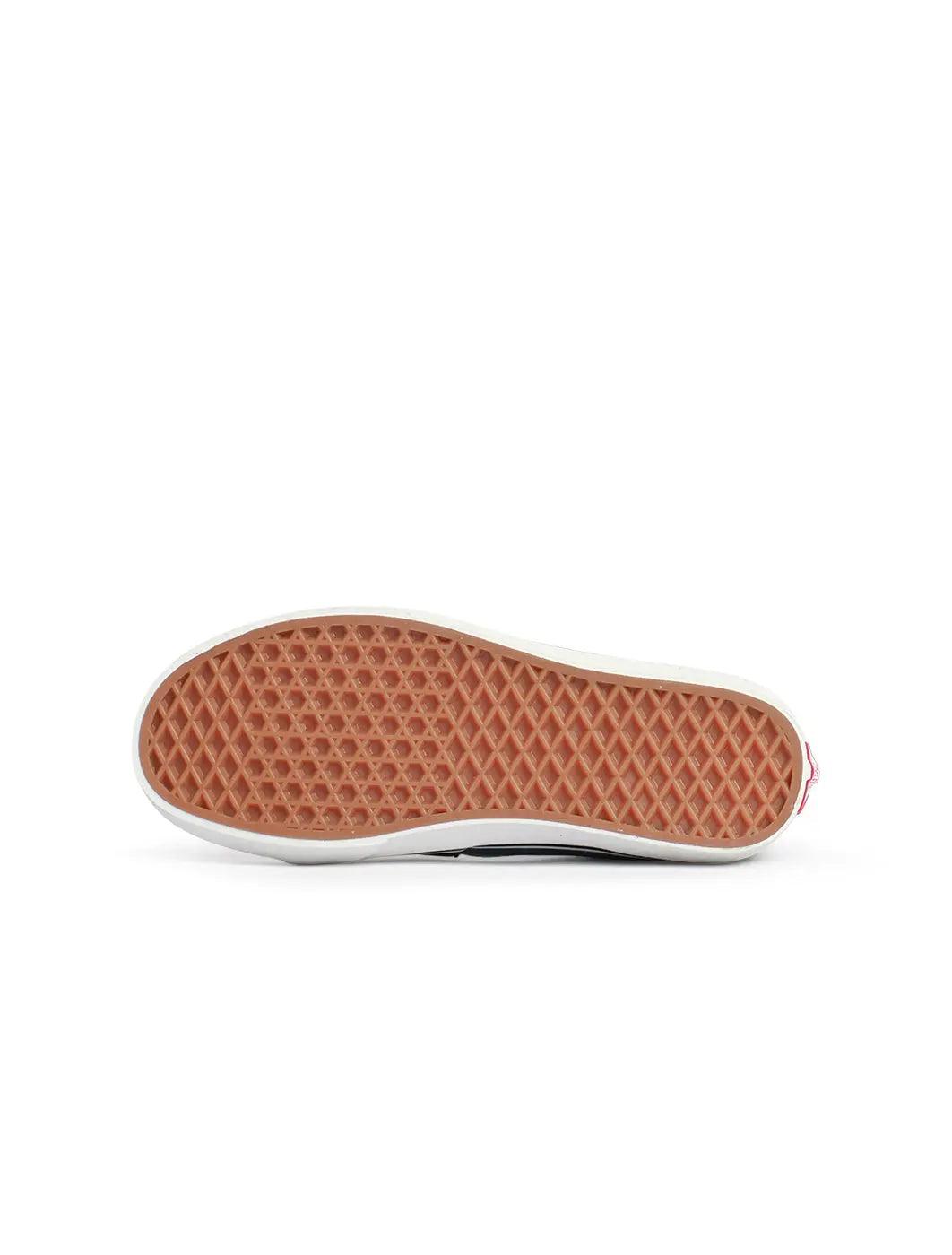 Denim Exchange men's Vans Classic Slip-On shoes in true white canvas with elastic side panels and rubber sole