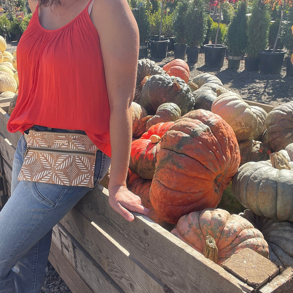 Carry Courage GUARDIAN belt bag in cream, shown from the front with an adjustable strap
